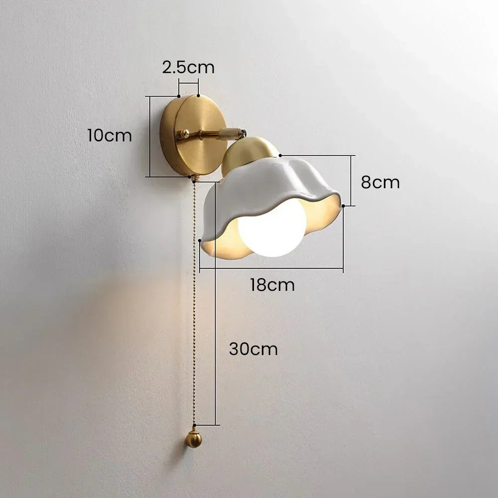 WaveGlow wall light with a wavy shade