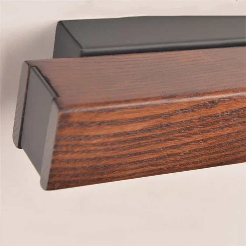 Nordlys wooden wall lamp – warm light in Nordic elegance