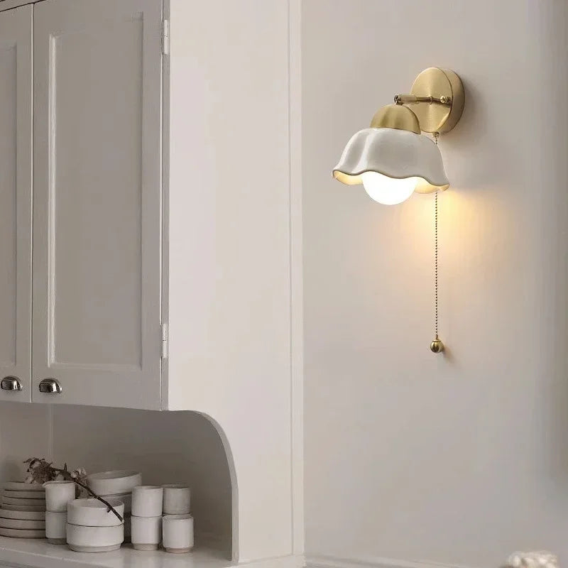 WaveGlow wall light with a wavy shade