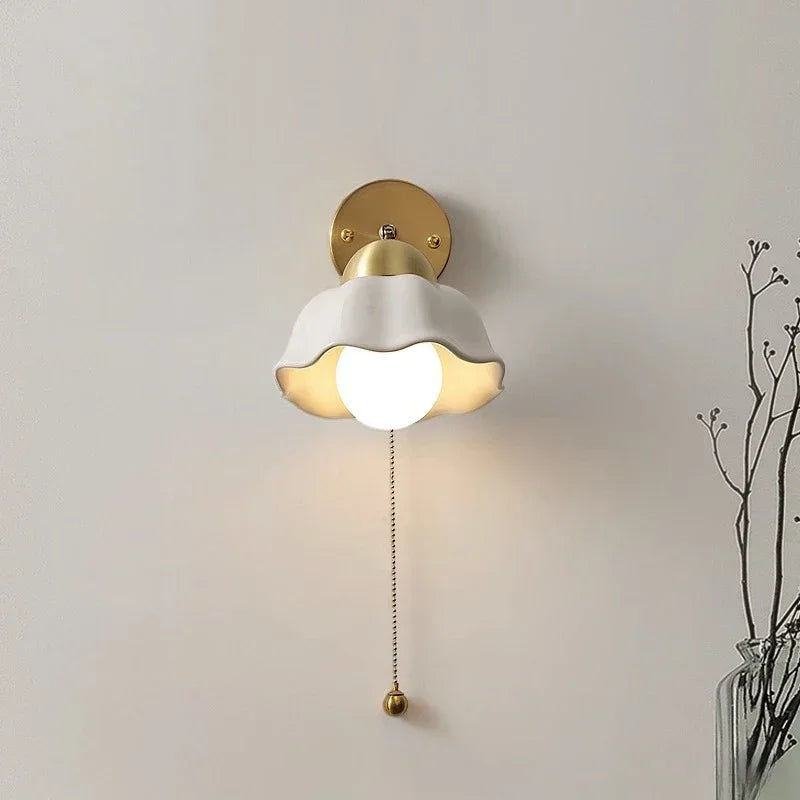 WaveGlow wall light with a wavy shade