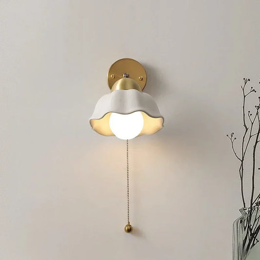 WaveGlow wall light with a wavy shade
