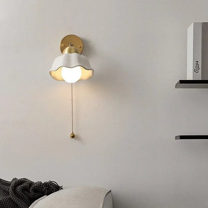 WaveGlow wall light with a wavy shade